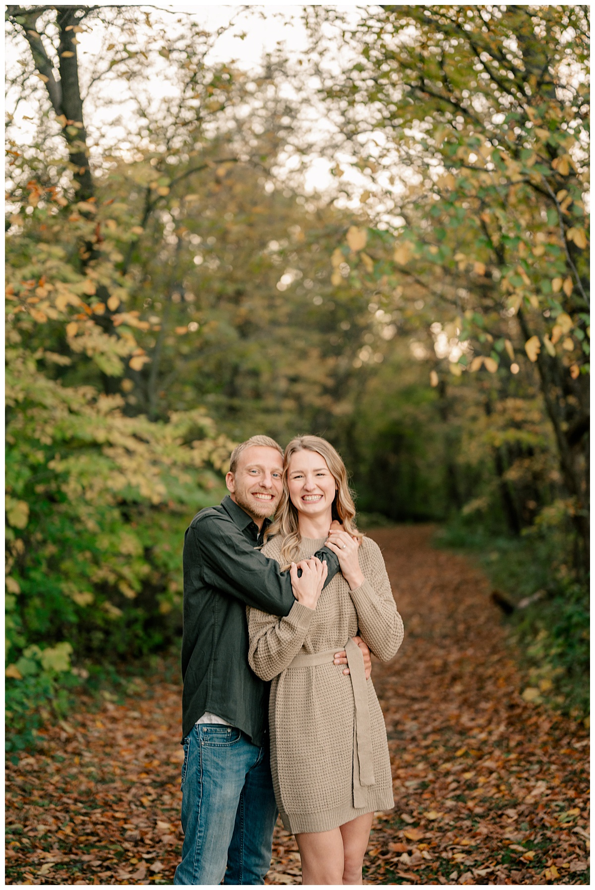 man wraps his arms around woman and hugs her to show the magic of engagement sessions