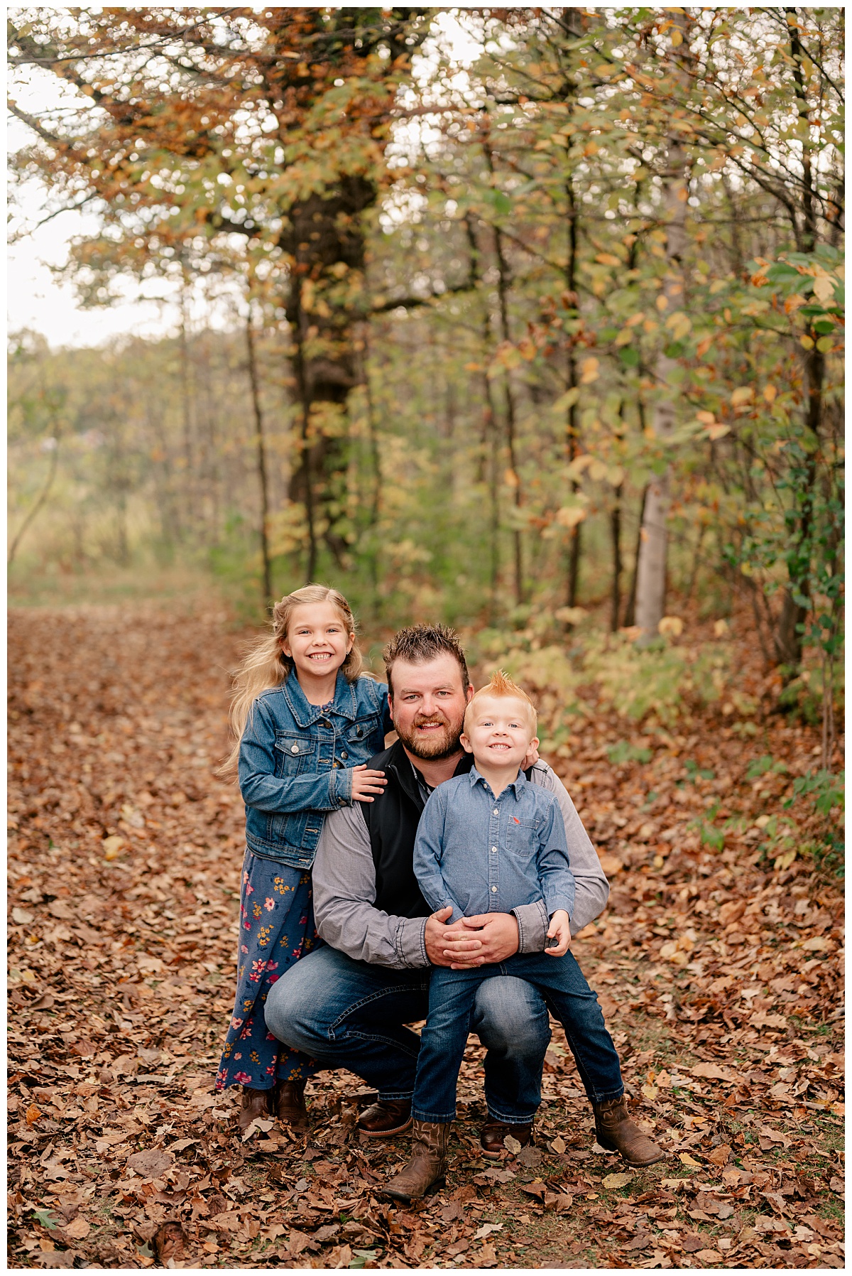 dad smiles with his kids by Minnesota photographer