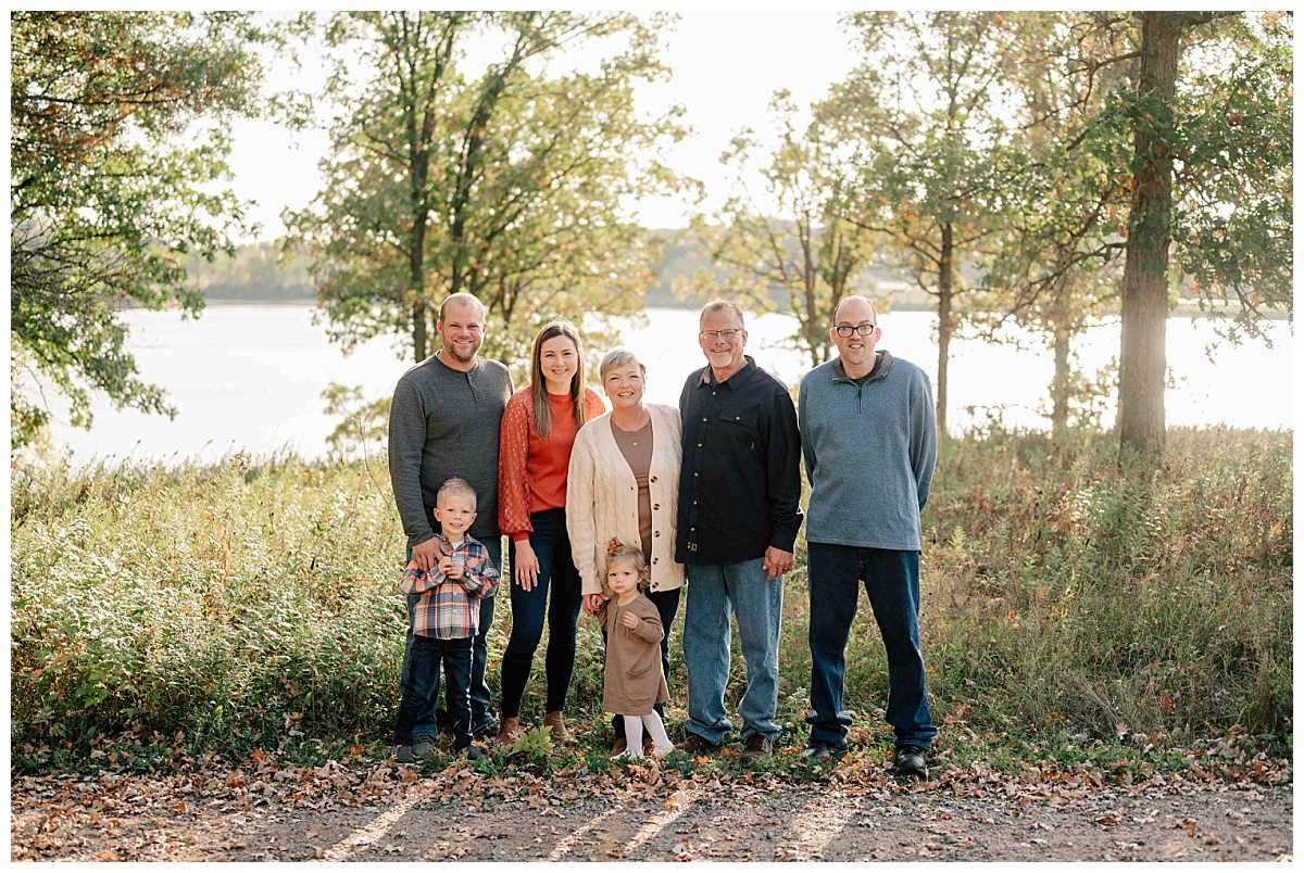 extended family gathers together during fall mini sessions