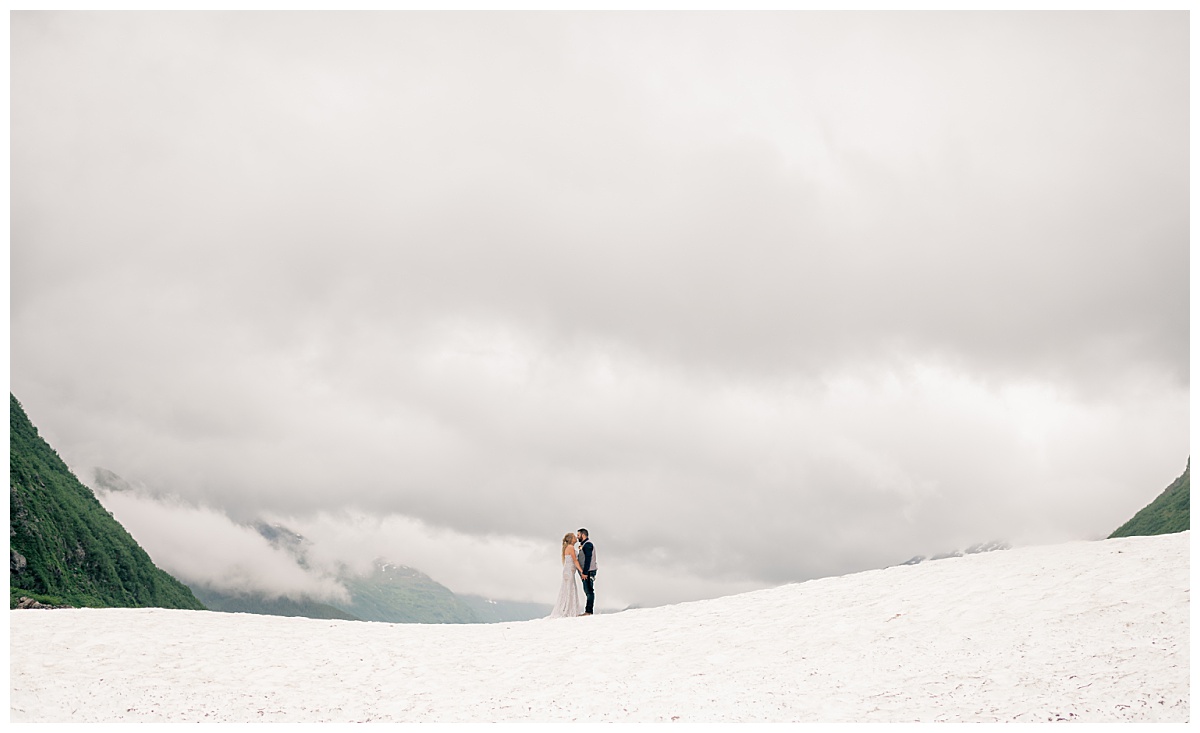 couple holds hands looking at each other at photographer's favorite engagement & elopement session destinations