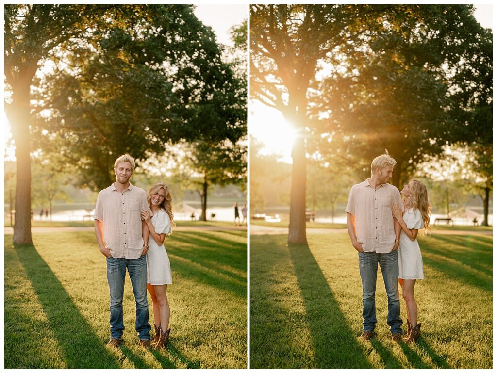 man and woman took at each other as sun shines through trees at Fish Park engagement session