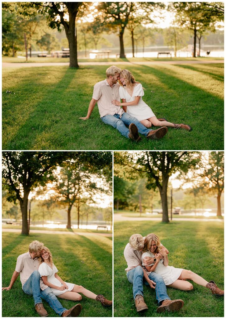 engaged couple laughs together sitting on grass by Rule Creative Co