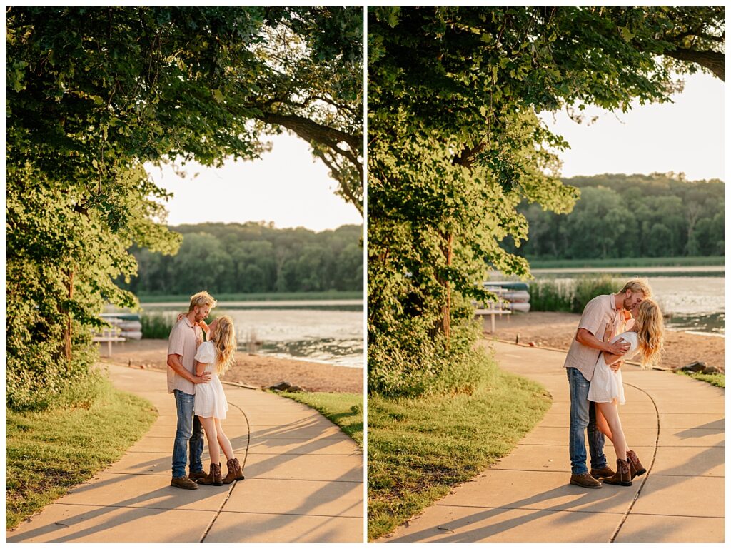 couple kisses on sidewalk at Fish Park engagement session