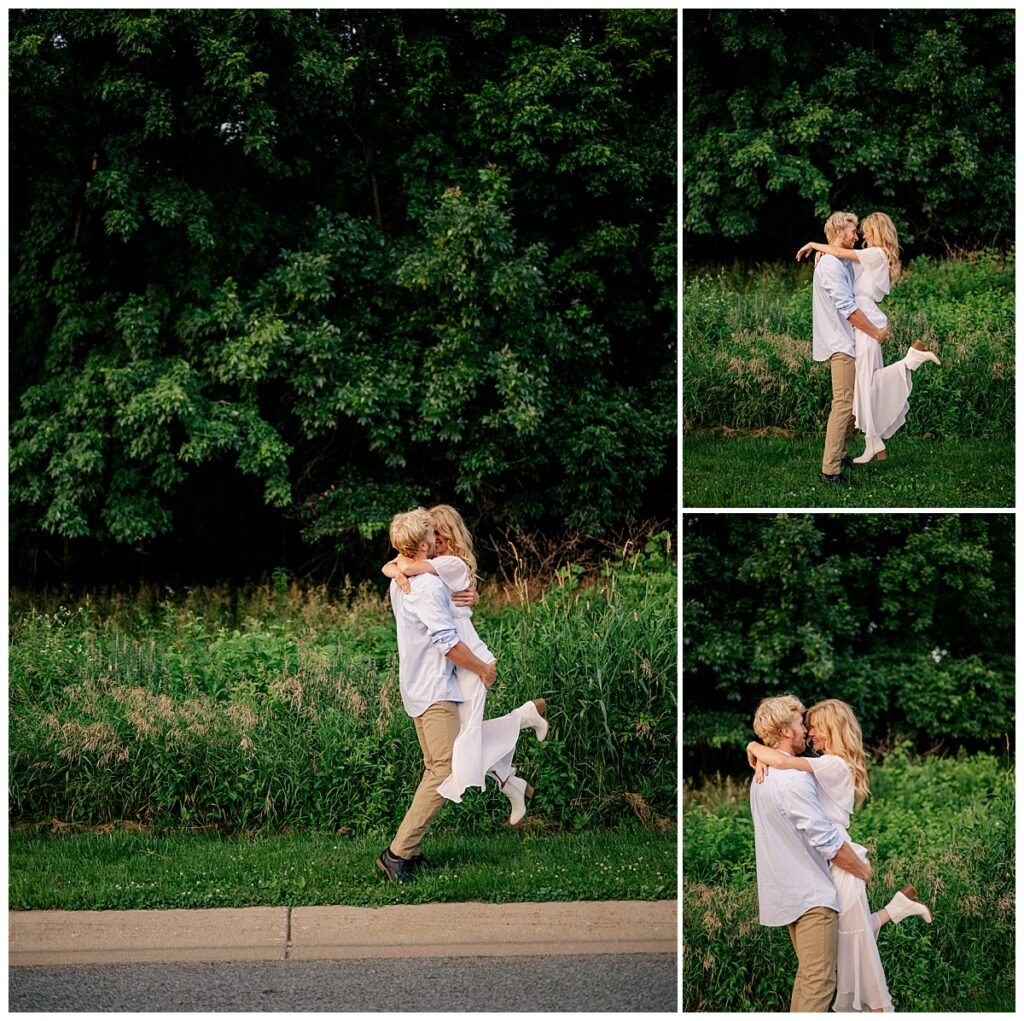 woman kicks up her leg as groom to be lifts her up by Minnesota wedding photographer