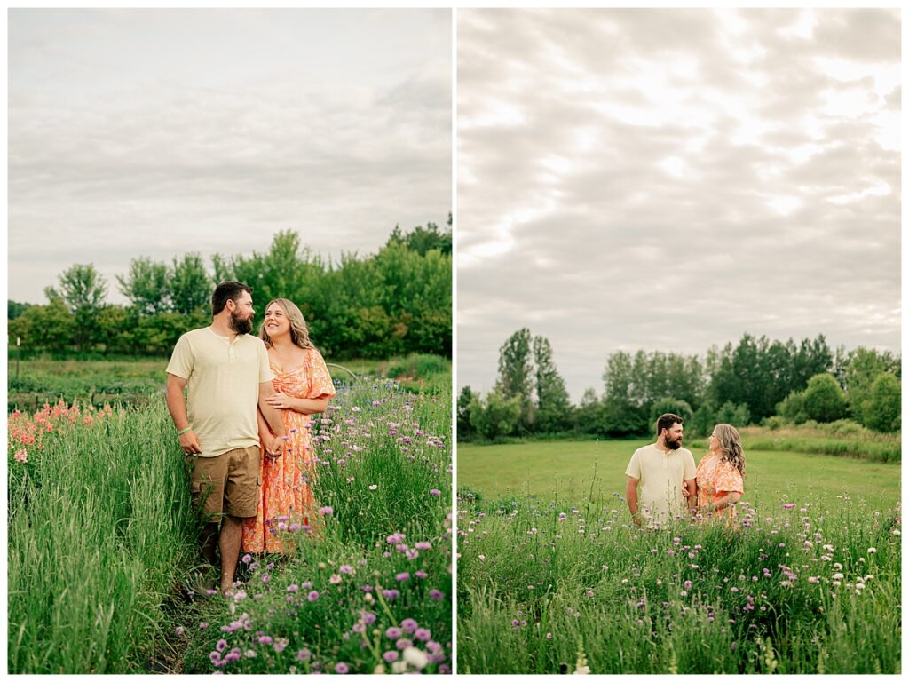 man and woman walk through flower garden by Minnesota photographer