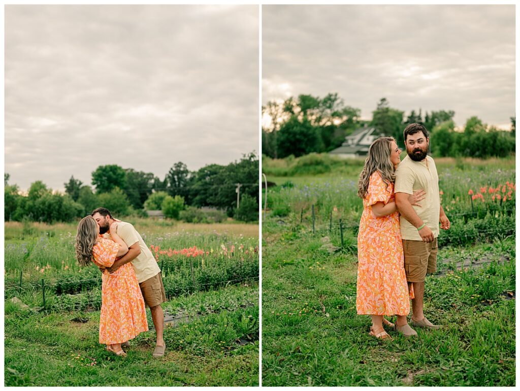 woman hugs husband from behind at flower farm couples session