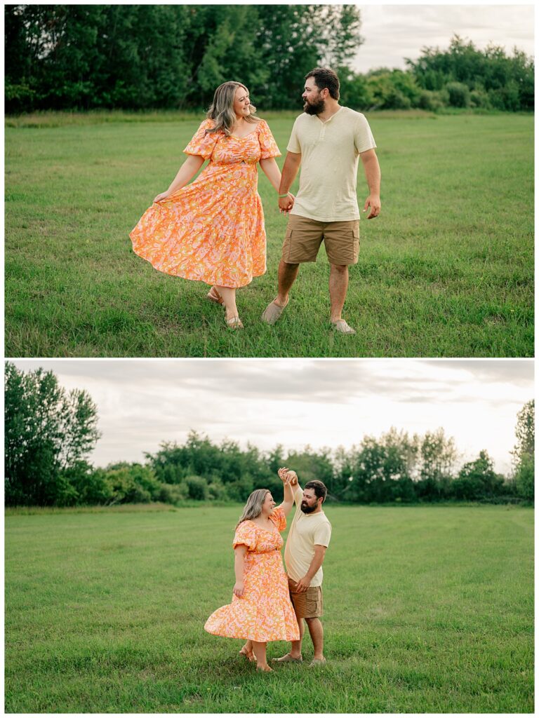 partners walk hand in hand through field by Minnesota photographer