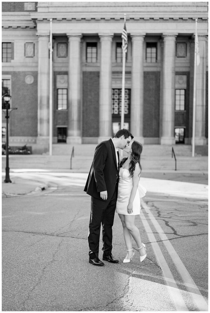 fiancées kiss in the middle of the road by Rule Creative Co