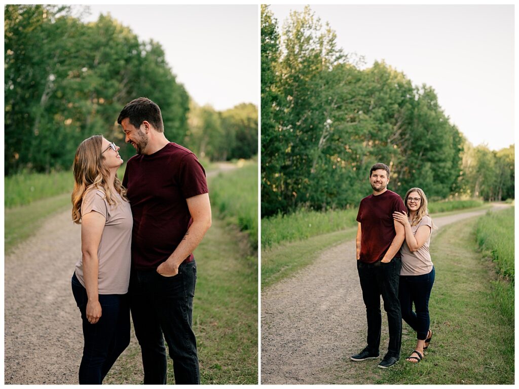 man and woman face each other smiling at Quarry Park evening engagement session 