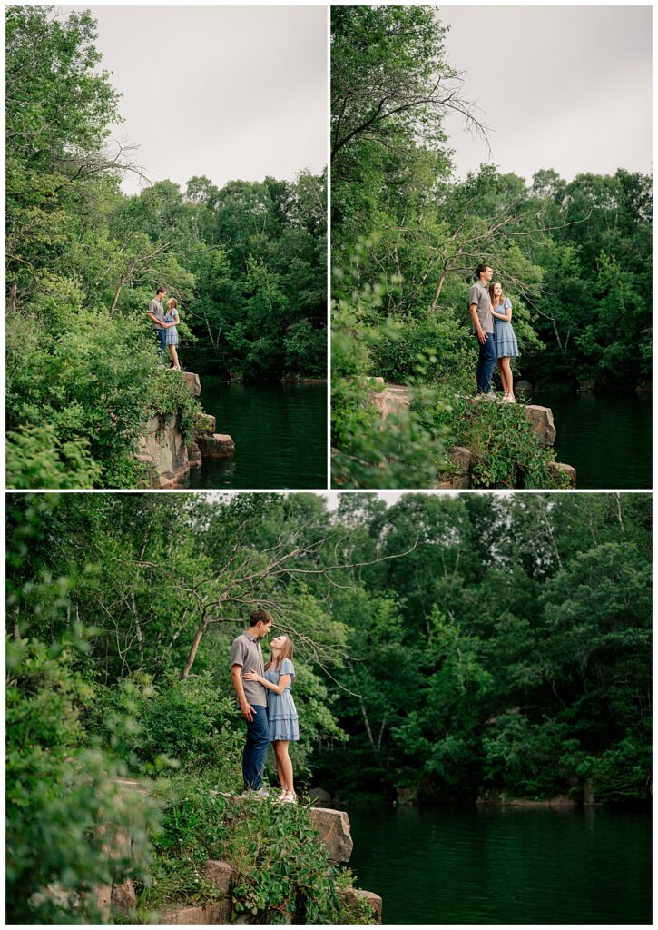 man and woman stand on rocks above water at Nature Preserve engagement session