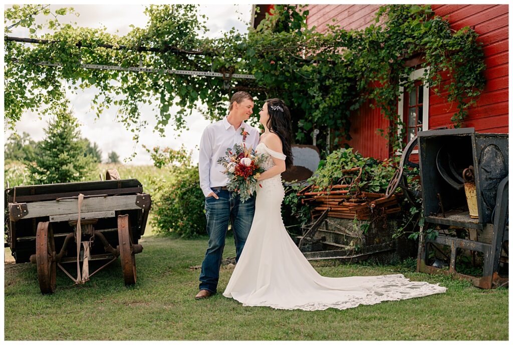 bride and groom look into each other's eyes by Rule Creative Co