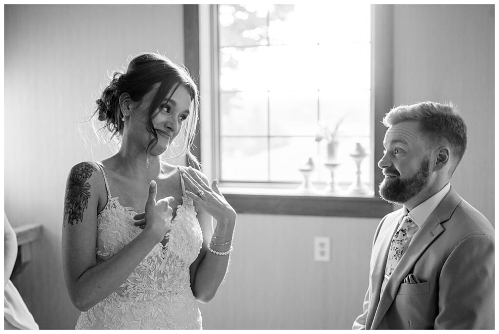 bride shows off her new ring to groom by Rule Creative Co