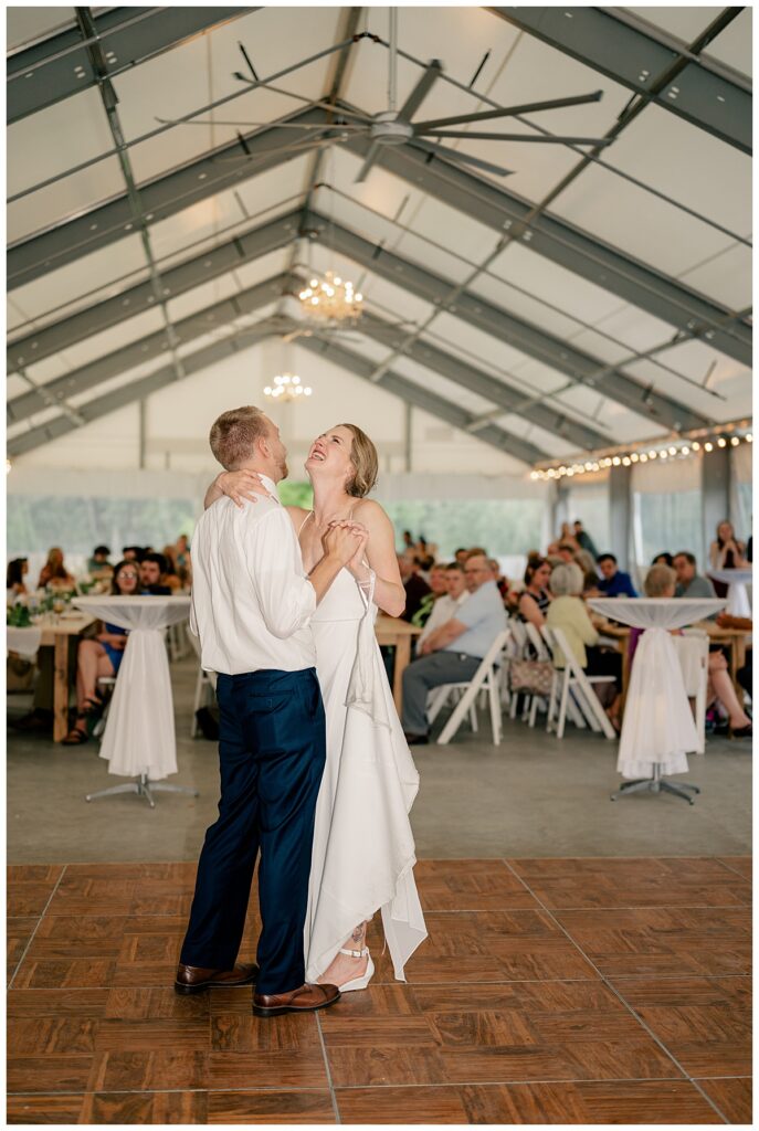 couple share their first dance as husband and wife by Minnesota wedding photographer