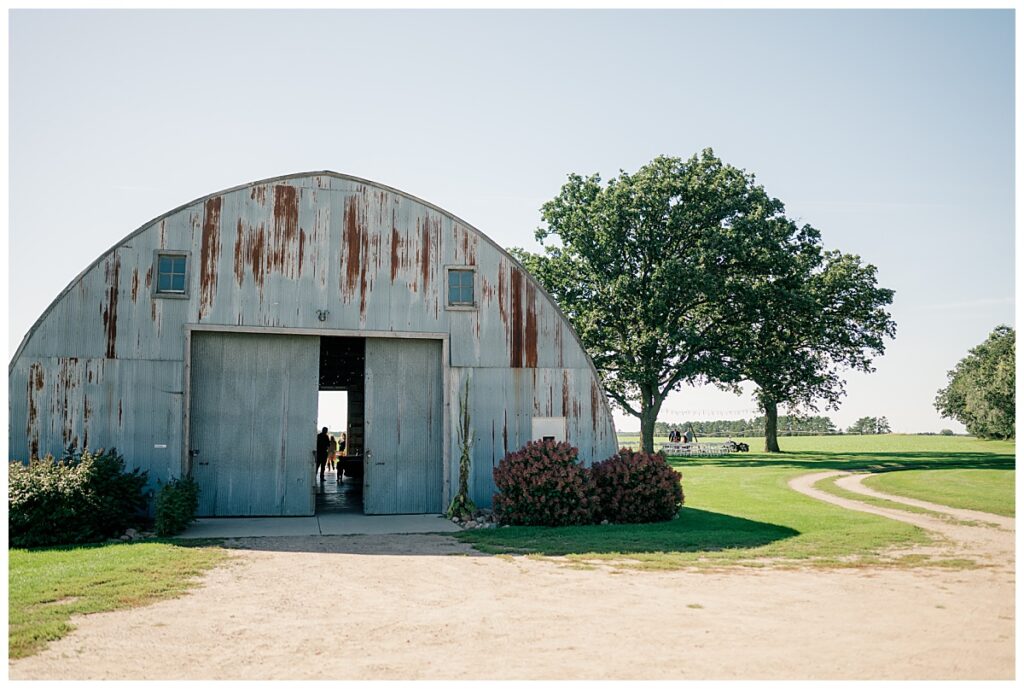 barn venue on bright sunny day by Minnesota wedding photographer