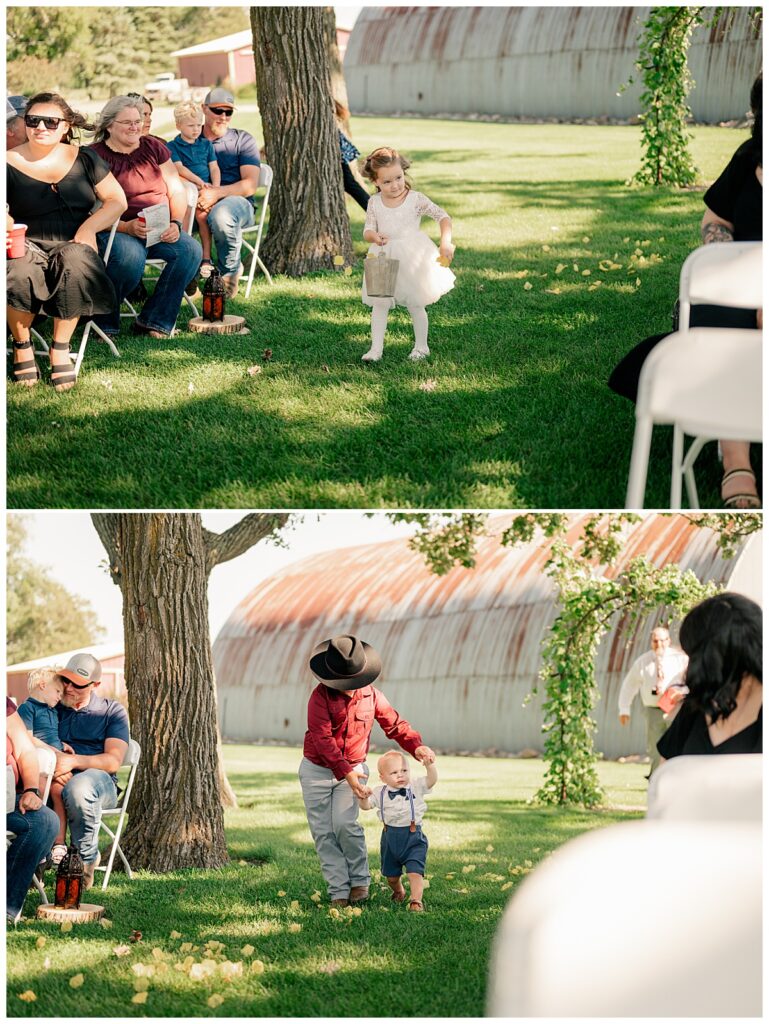 flower girl and young boy walk down aisle by Minnesota wedding photographer