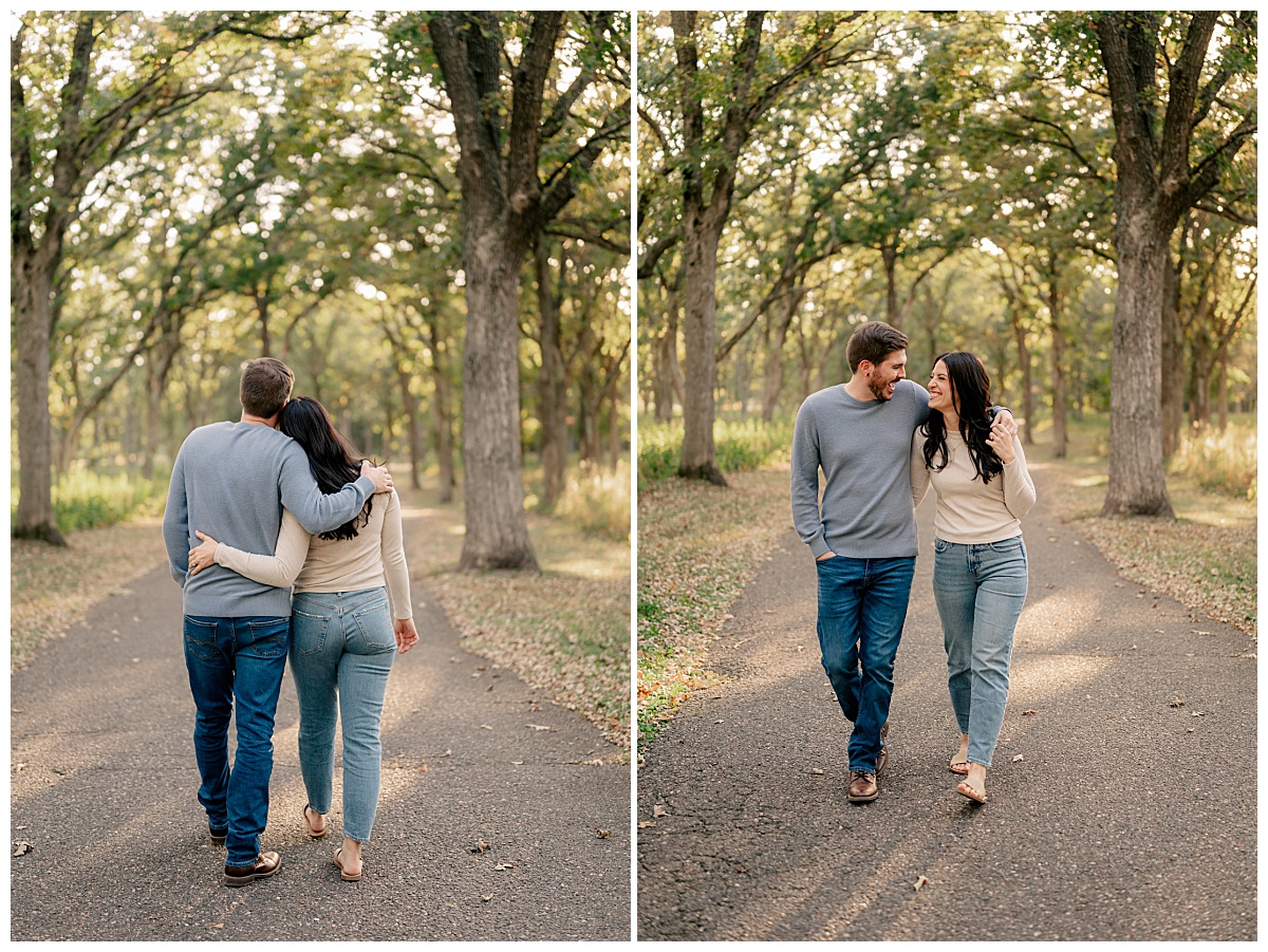 brunette woman in cream sweater walks with man in Belle Prairie Park