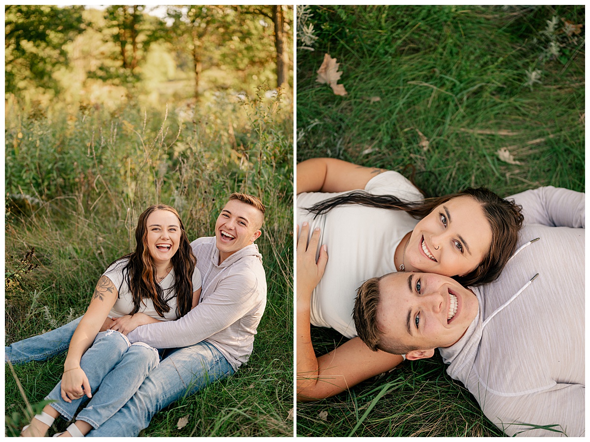 engaged couple sit in grass for playful St. John's engagement shoot