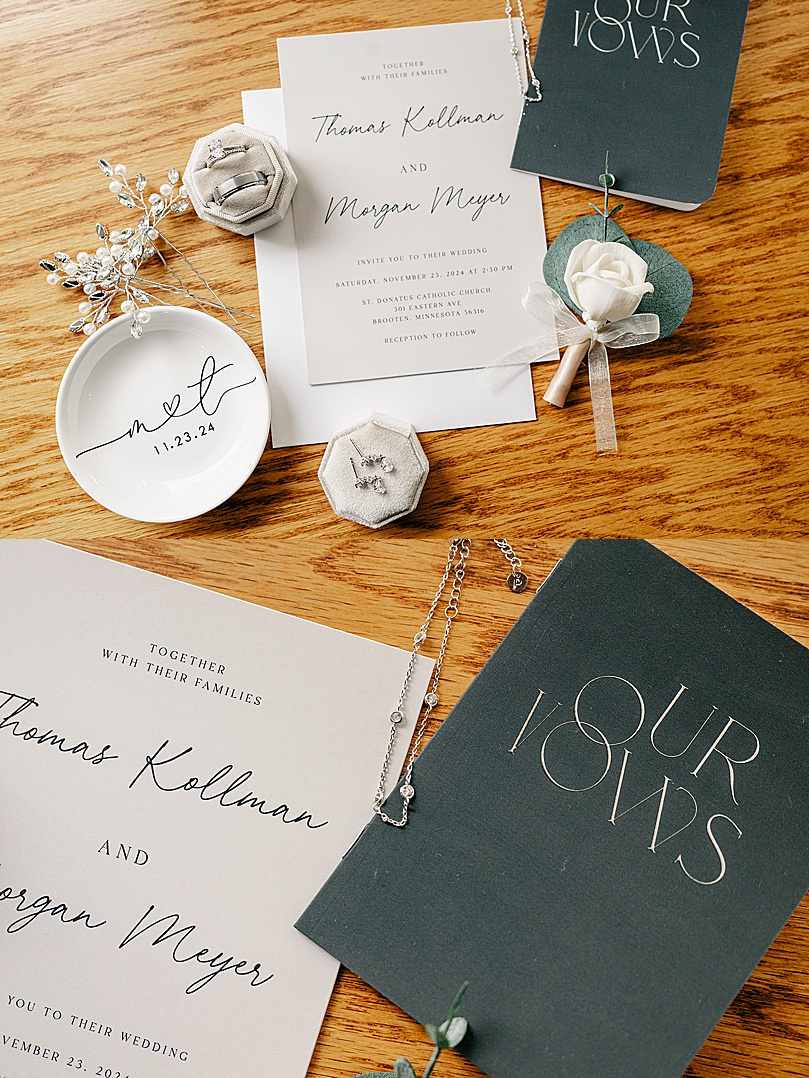 rings and jewelry laid on table for Romantic Winter Wedding in Brooten