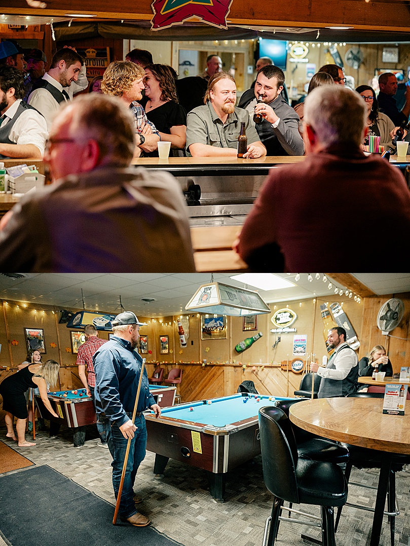 men play pool at reception by Minnesota wedding photographer