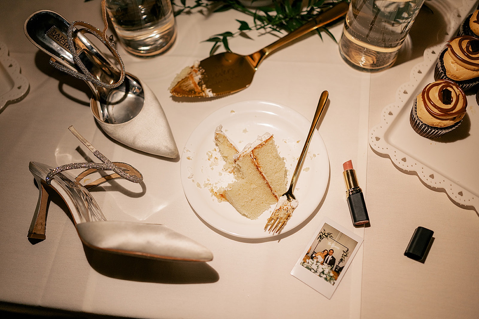 half eaten cake and kicked off shoes during reception by Rule Creative Co