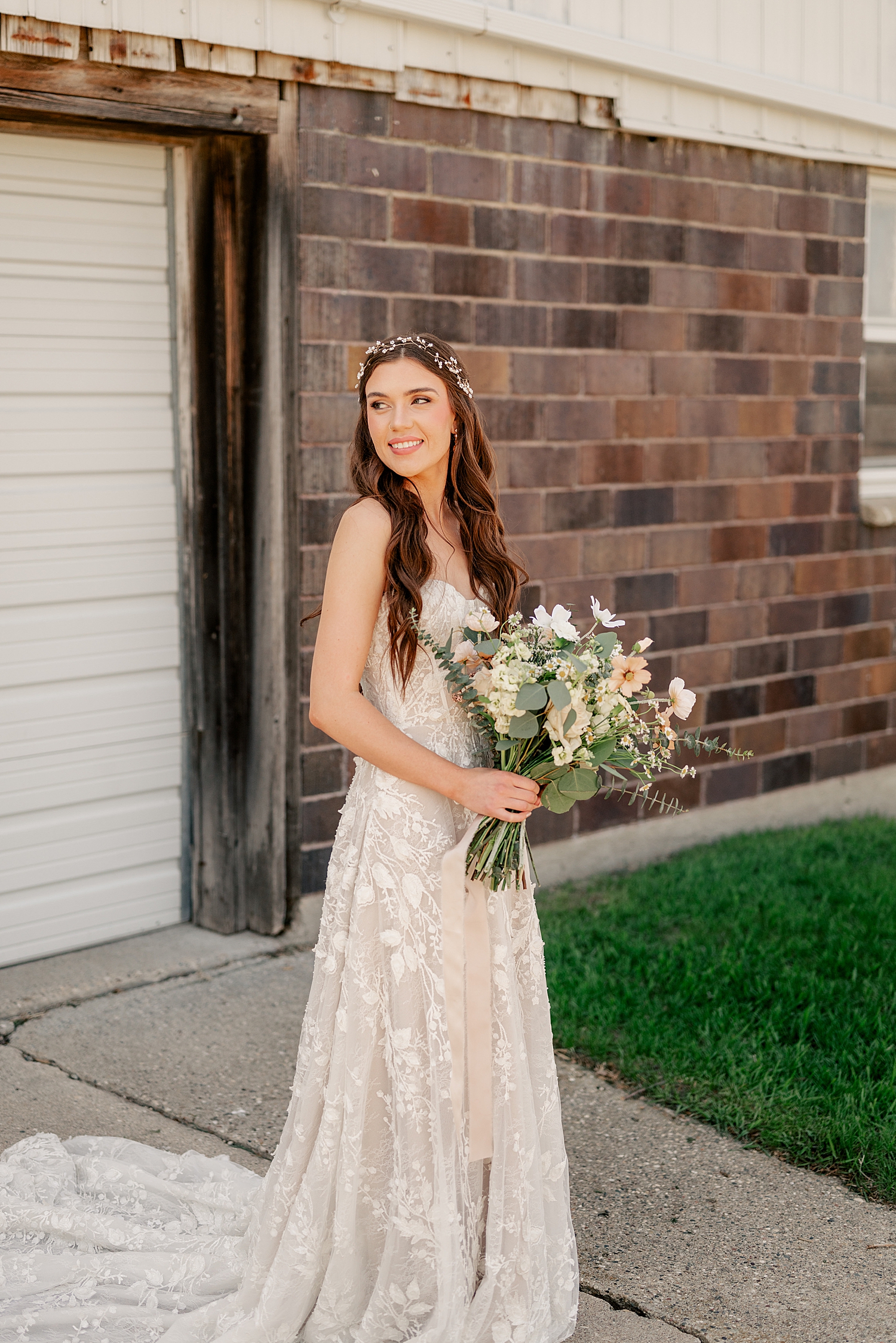 elegant bride with floral overlay dress by Minnesota wedding photographer