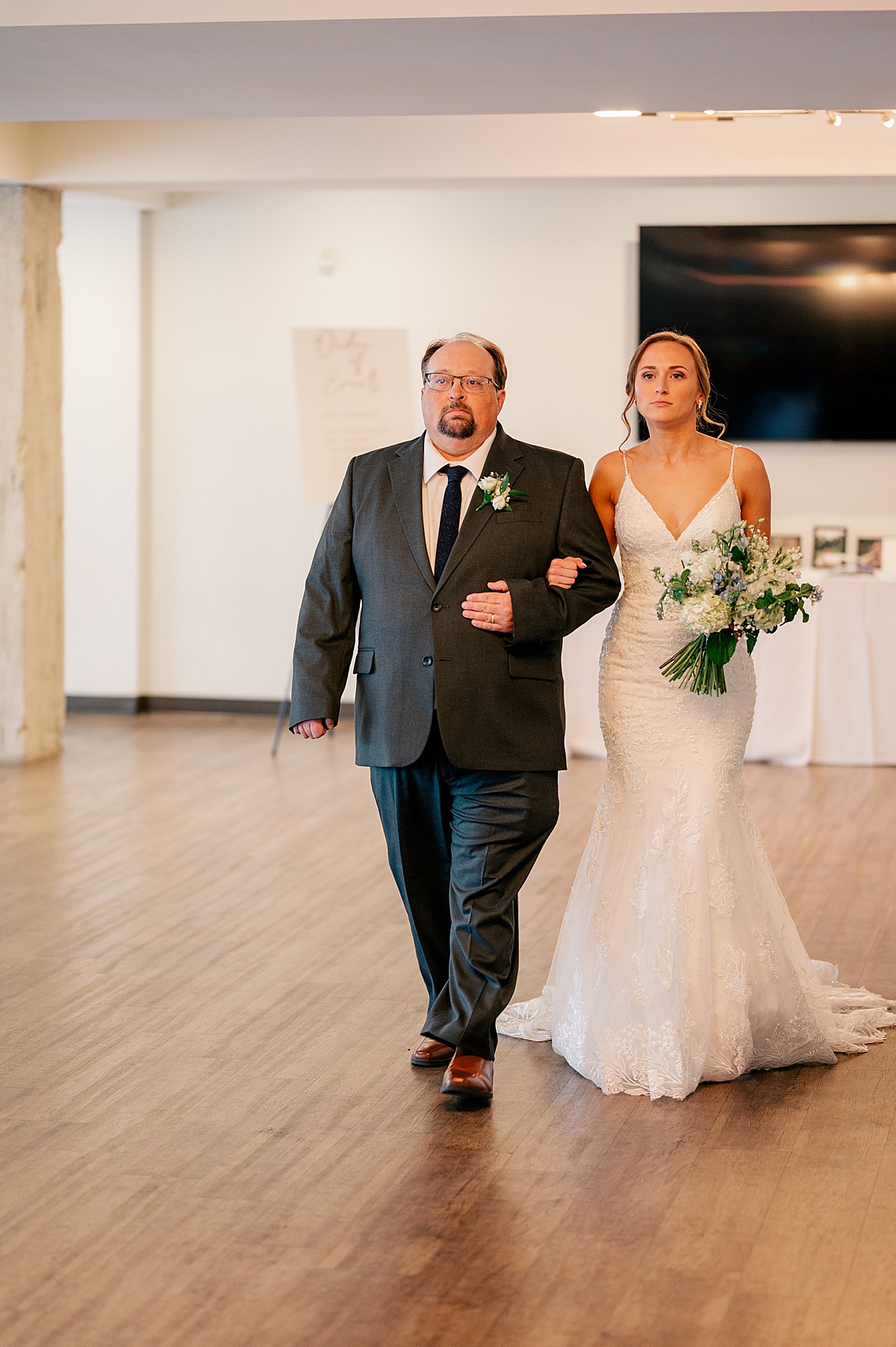 Father walking bride down the aisle on her Spring Wedding Day.