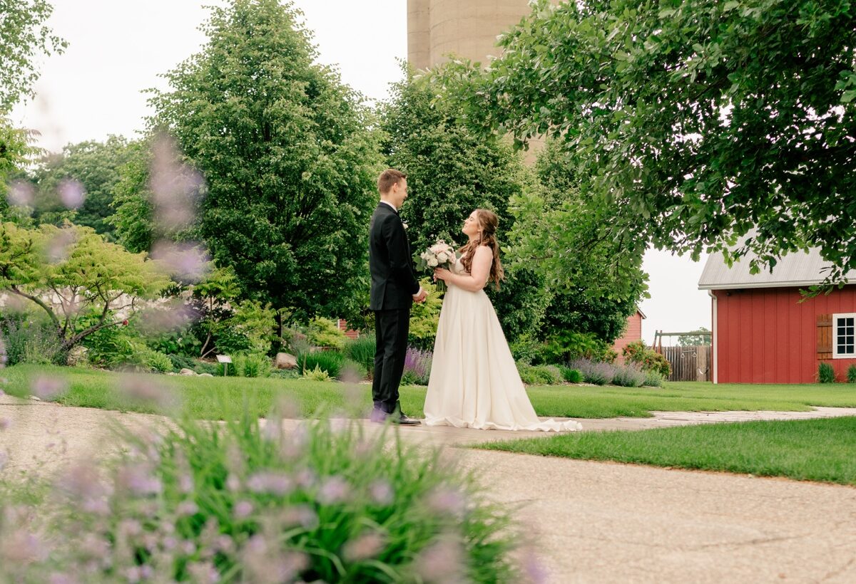 Bride and groom having a first look on wedding day by Rule Creative Co