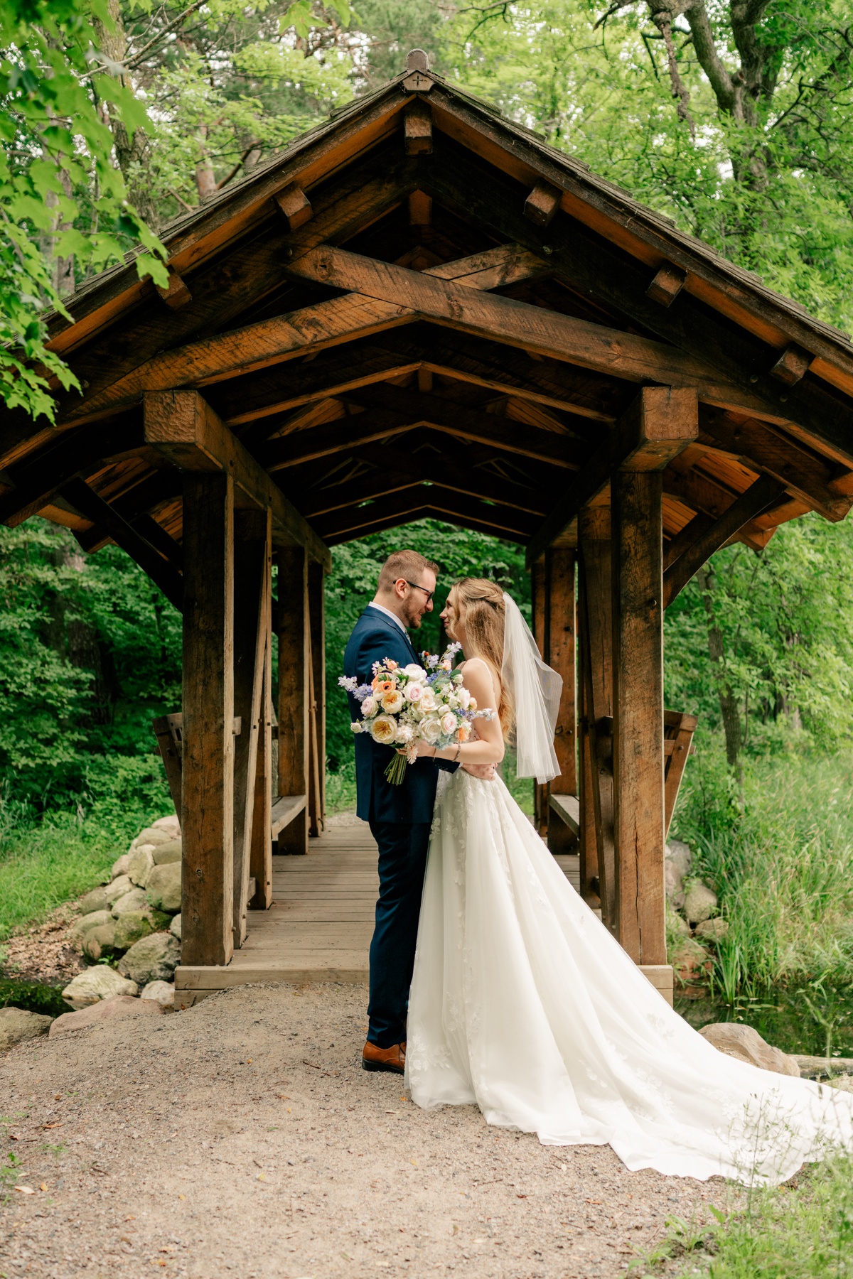 Bride walking down the aisle with her father during Heartfelt Summer Wedding
