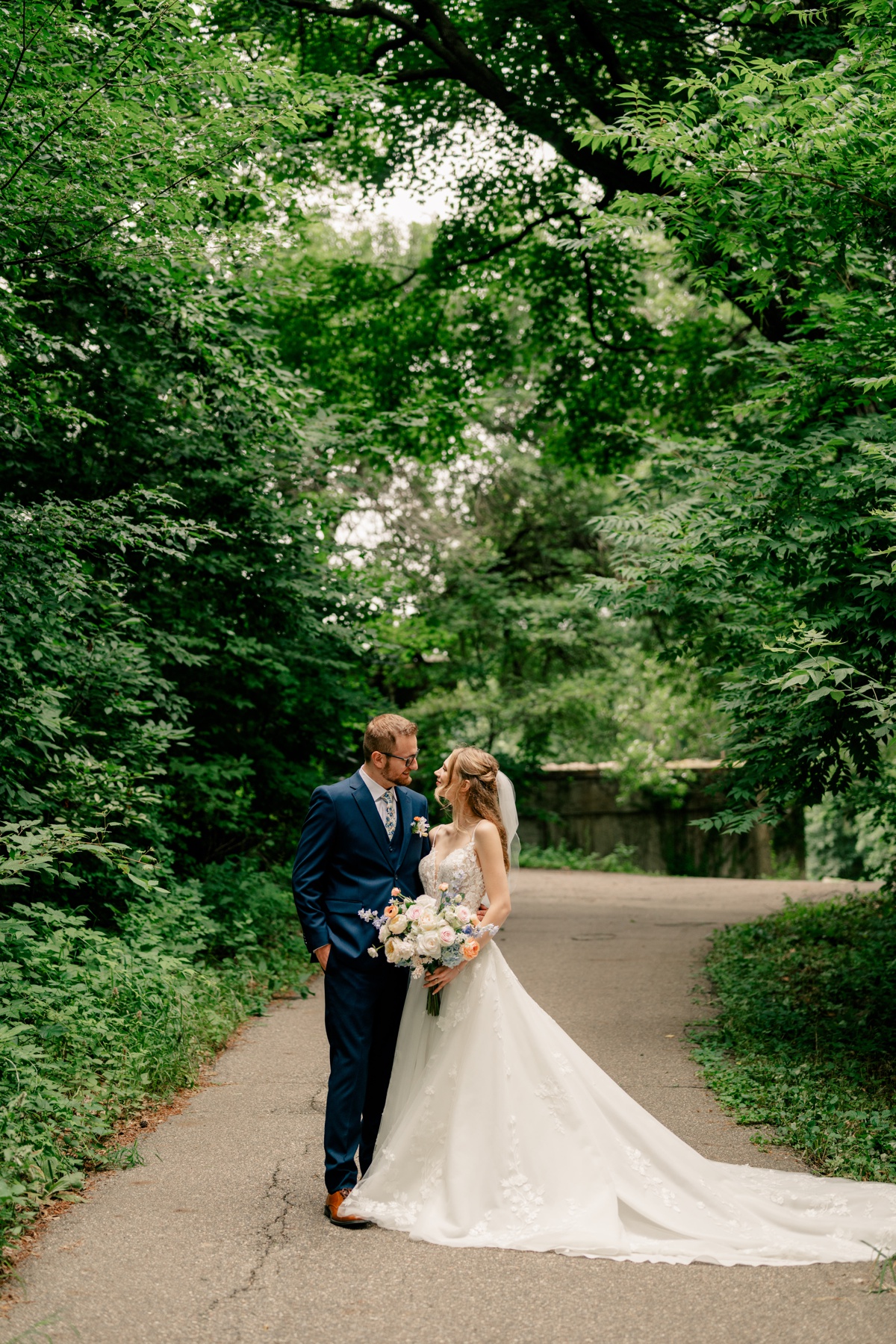 Newlyweds loving gaze at each other during Fairytale Summer Wedding