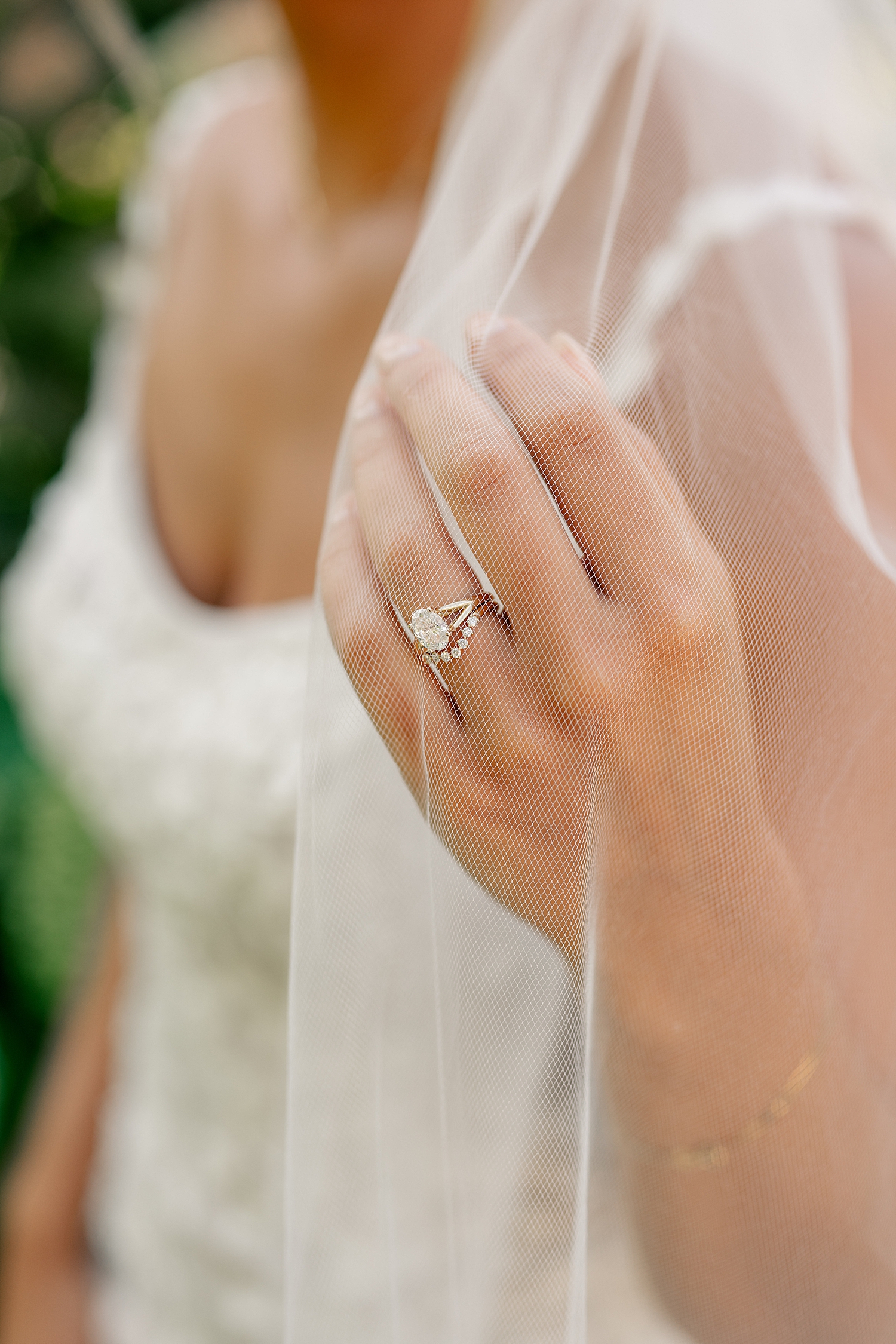 woman shoes off her diamond ring under her viel at Redeemed Farm