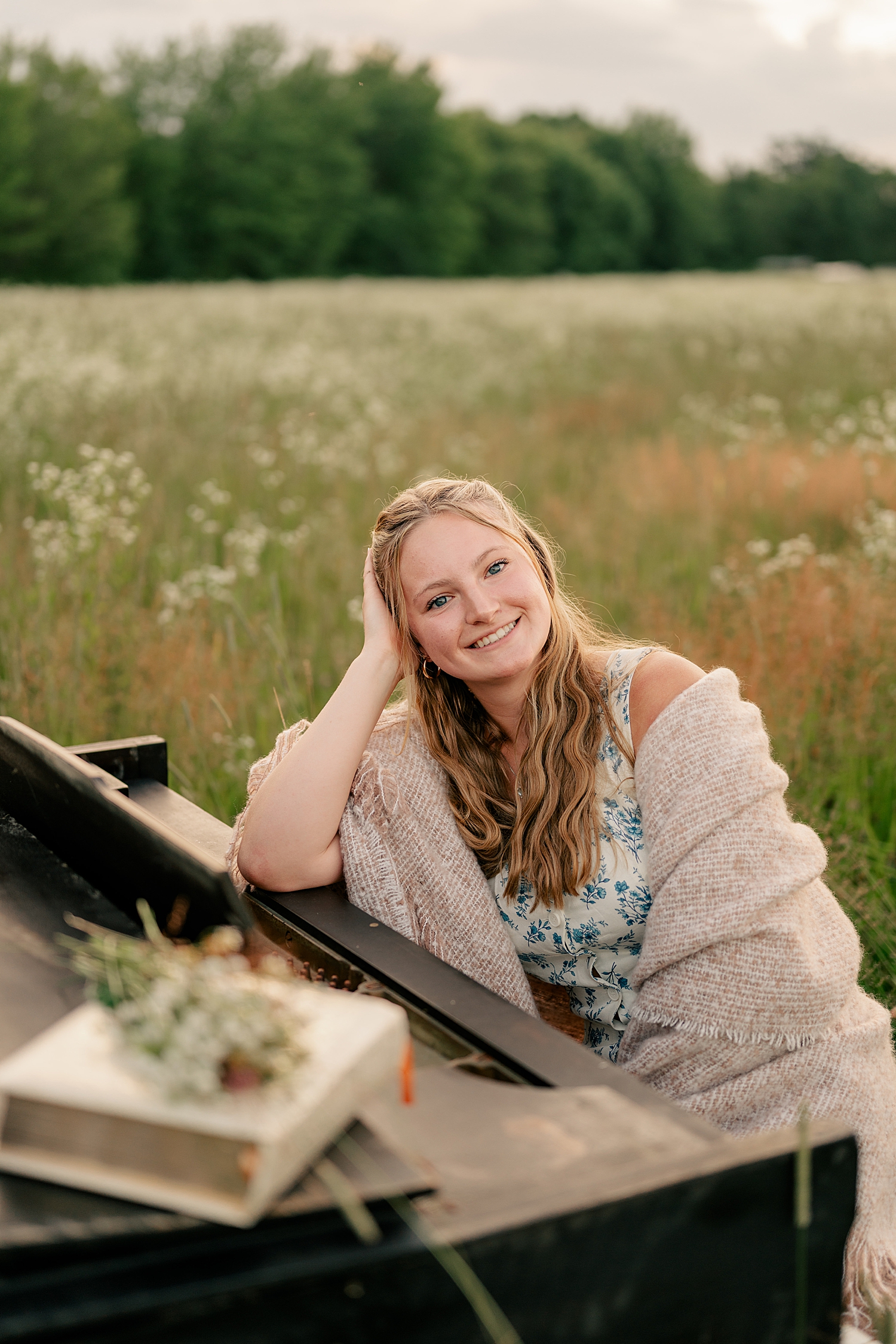 girl leans against keys of instrument by Rule Creative Co