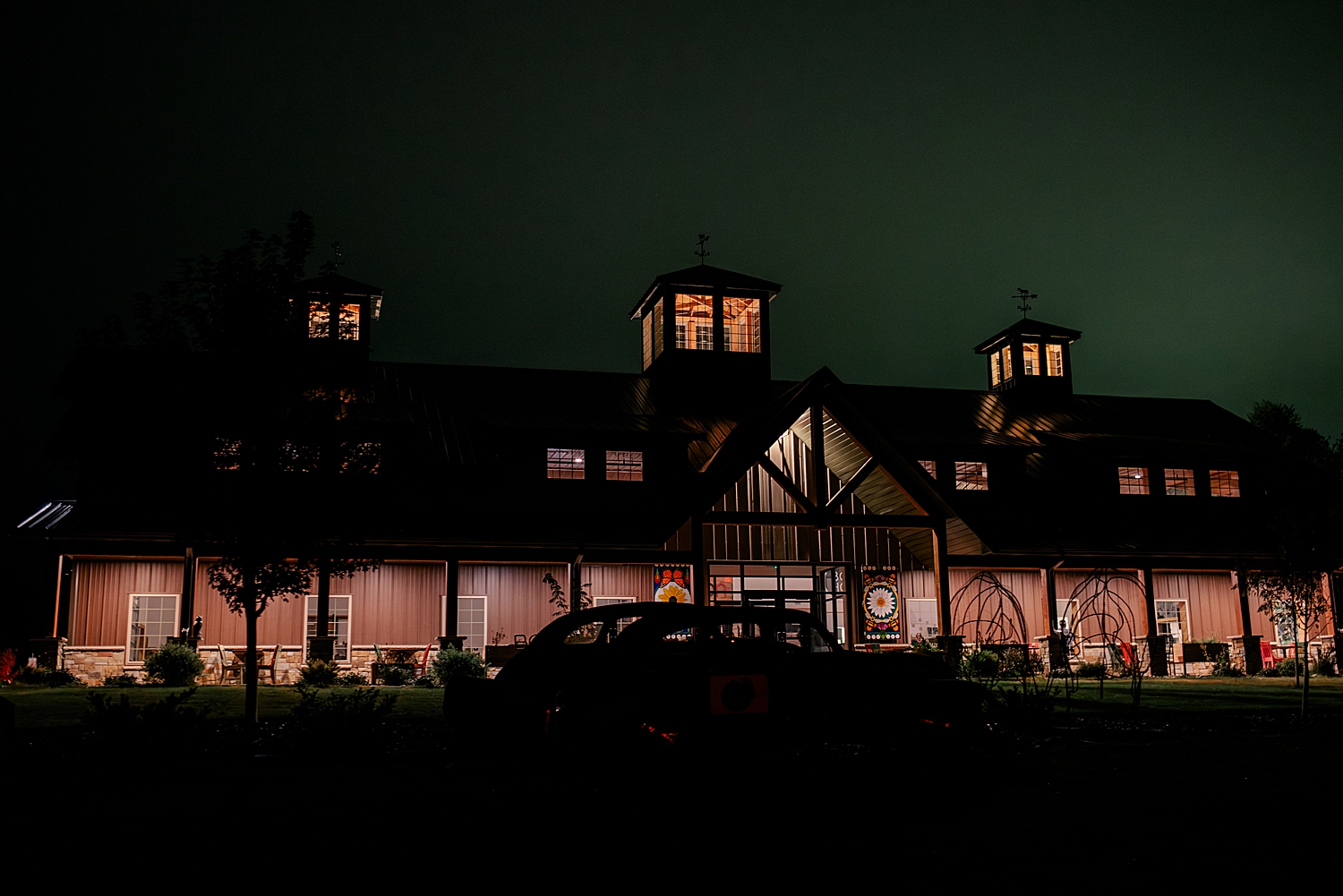 Art in Motion venue in the night time lit up for reception 