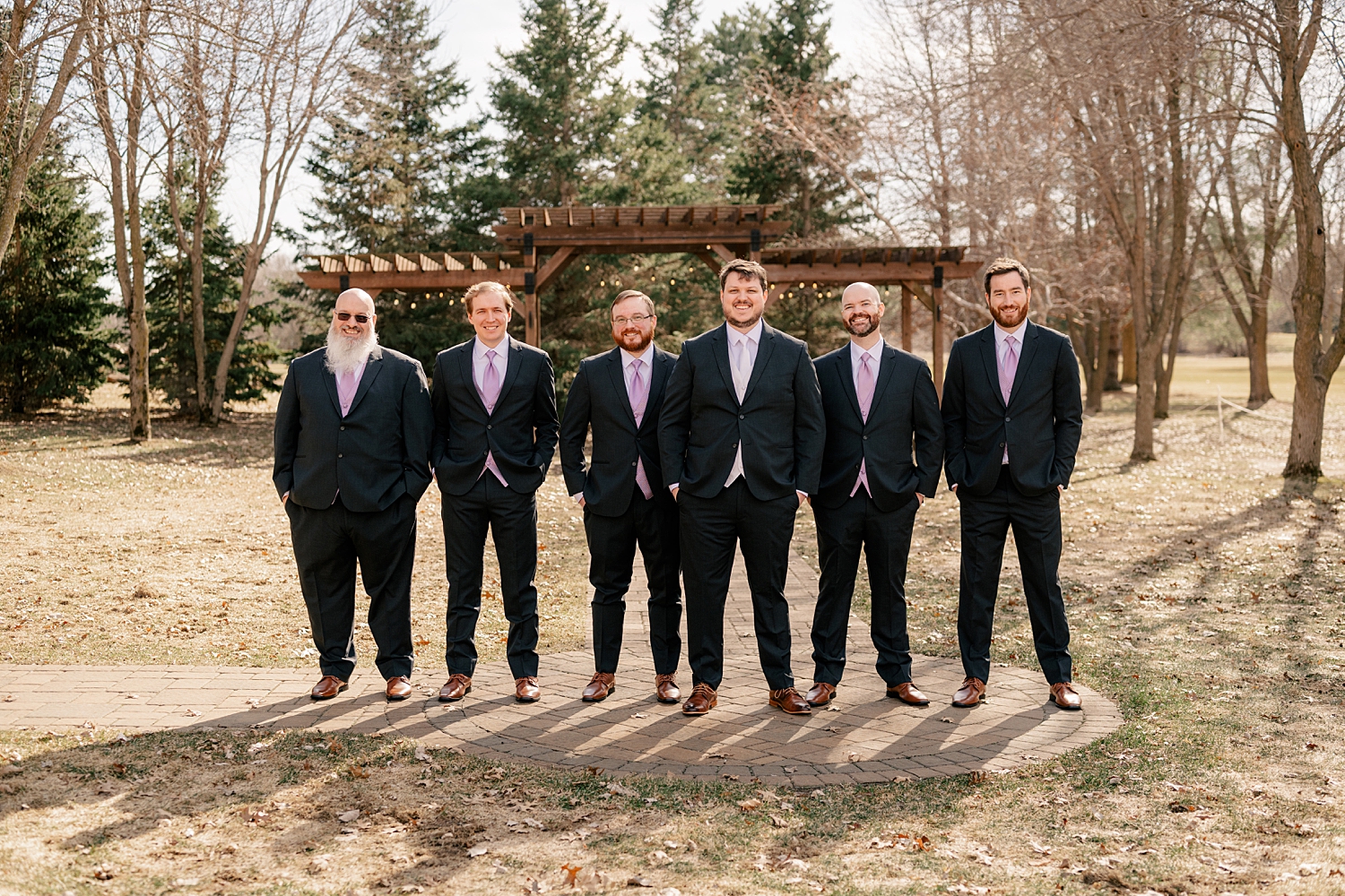 man surrounded by his best friends on his big day by MN Elopement Photographer