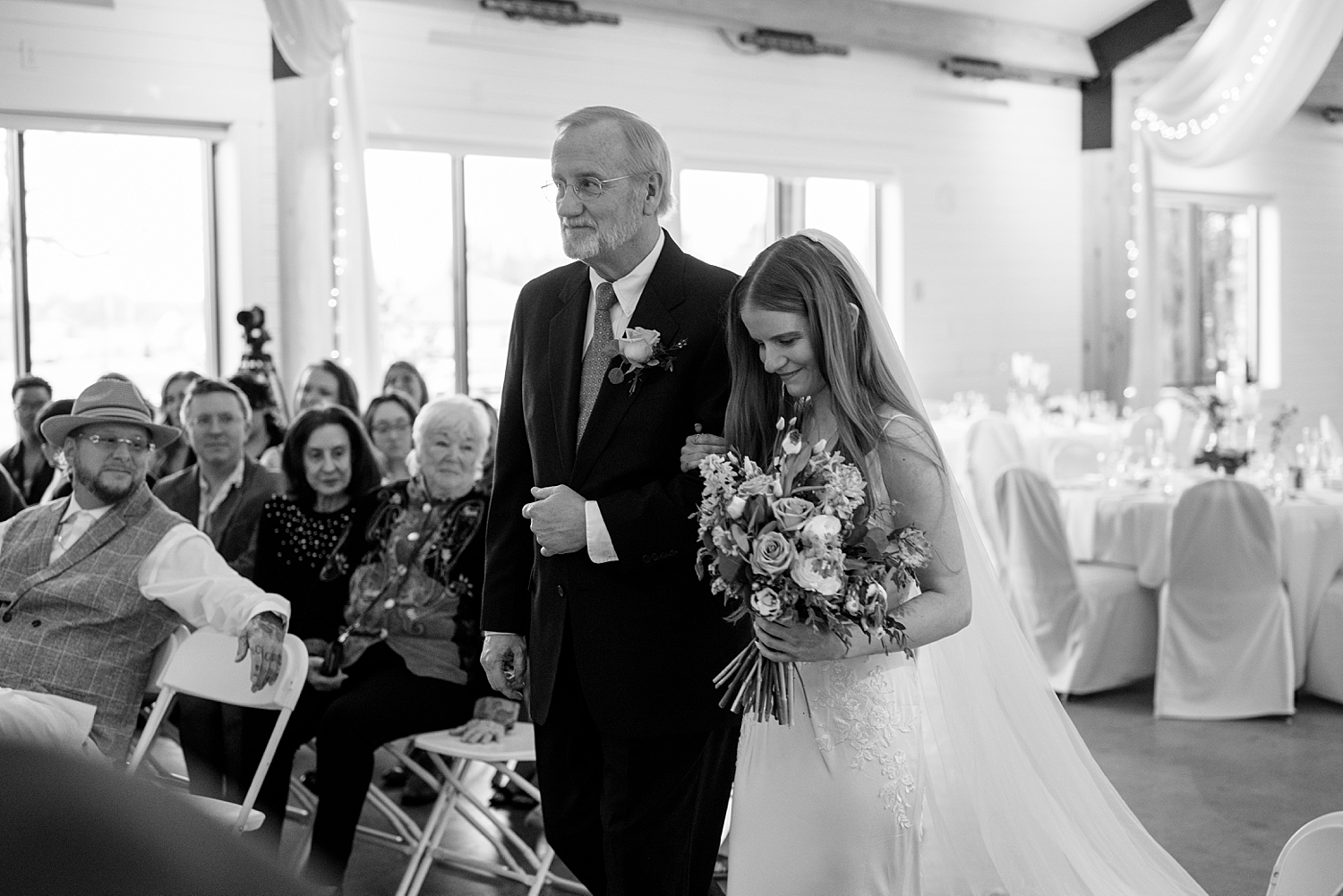 father walks daughter down the aisle for Minnesota Spring Wedding