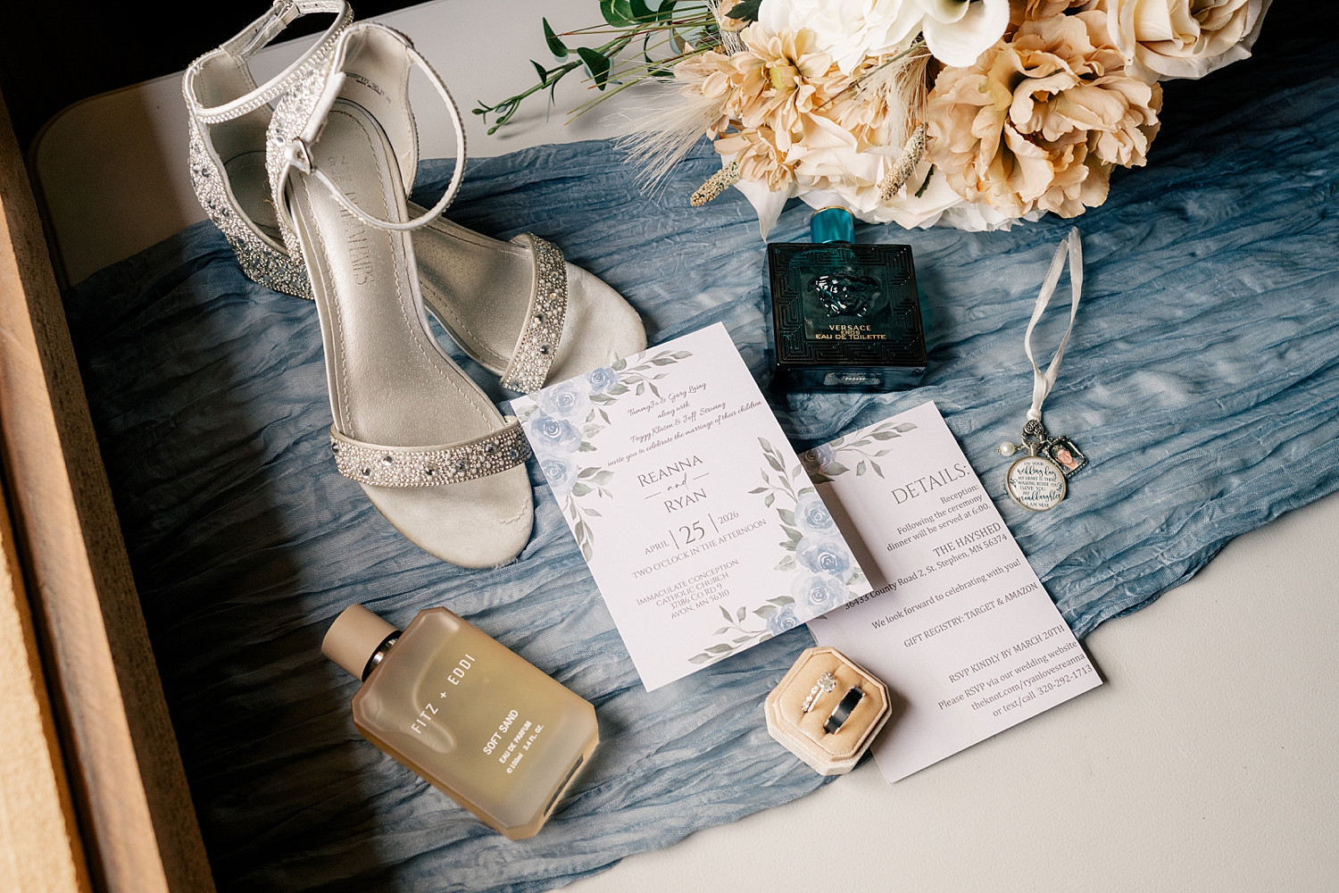 invitation suite on blue cloth by Rule Creative Co
