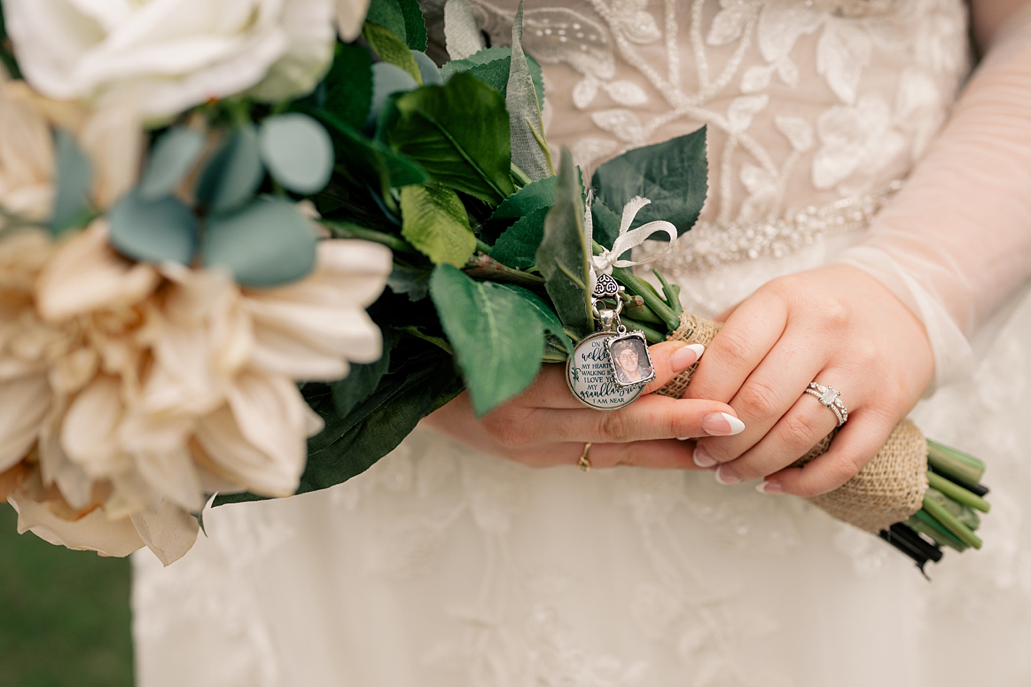 Remembrance charm on bouquet by MN elopement photographer