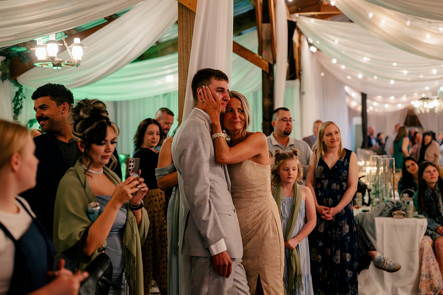mom and son cry watching dancing at reception by Rule Creative Co 