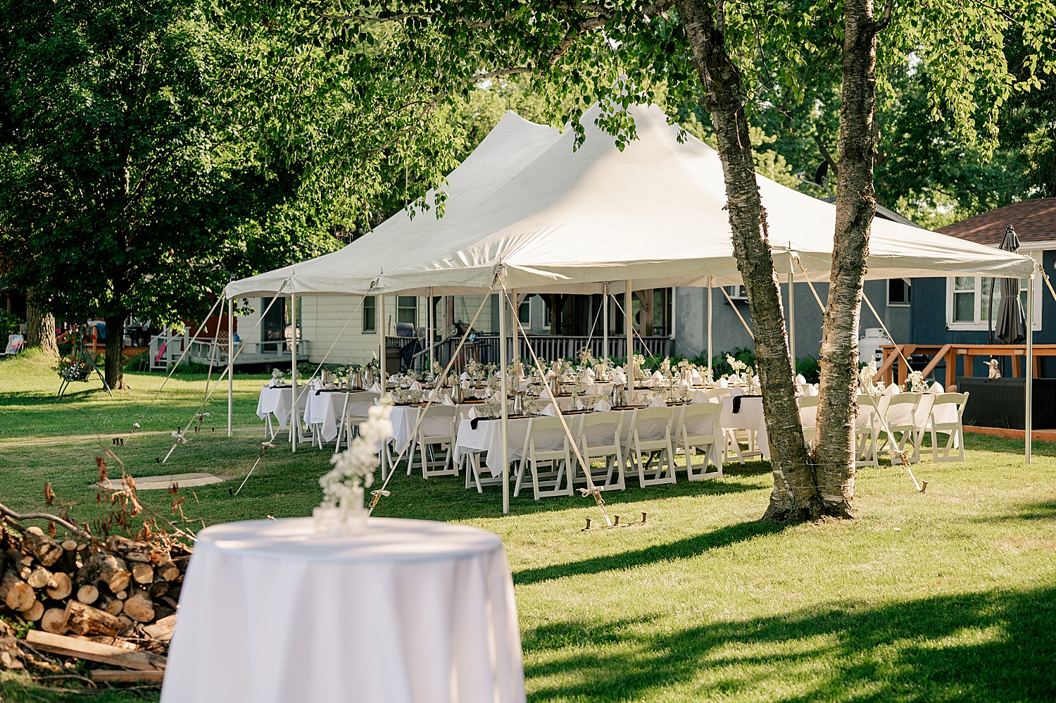 reception tent set up at family farm by the lake by Rule Creative Co