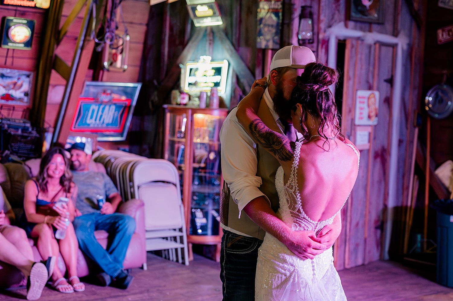 man and woman dance closely at their reception by Minnesota wedding photographer