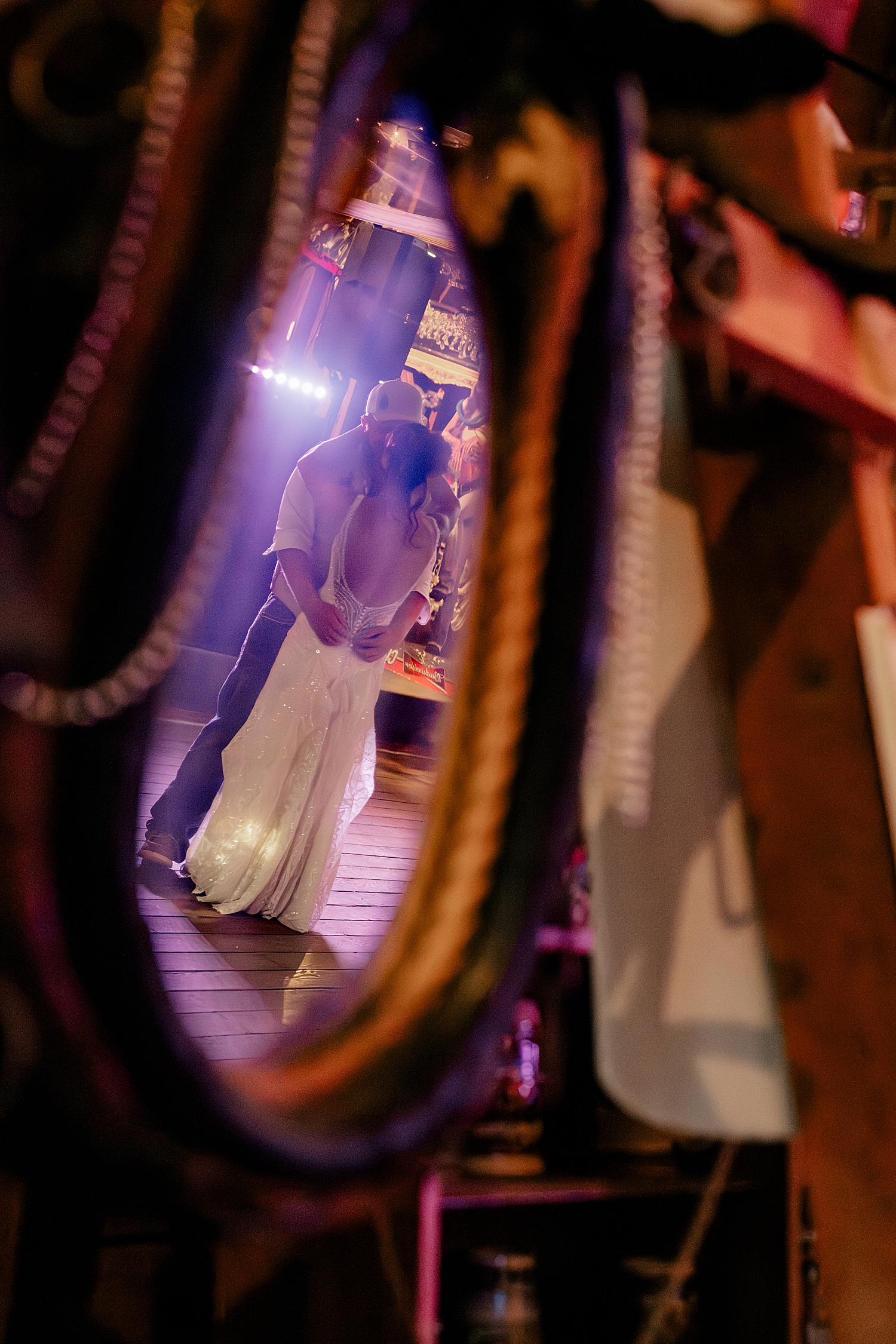 Newlyweds seen dancing in mirror reflections for red barn wedding